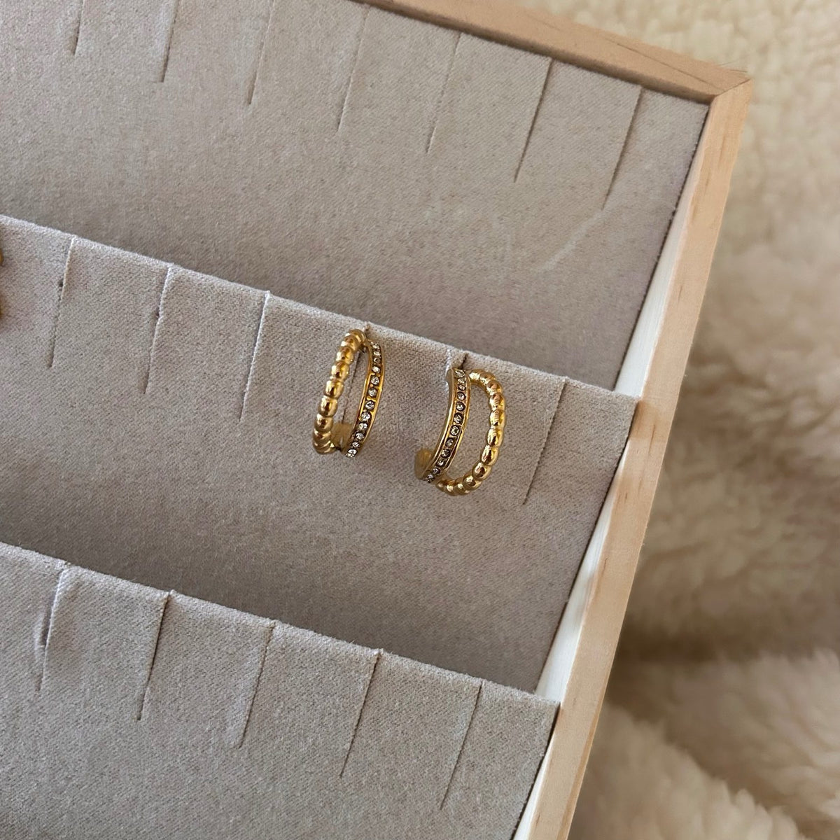 Twist Huggie Hoops